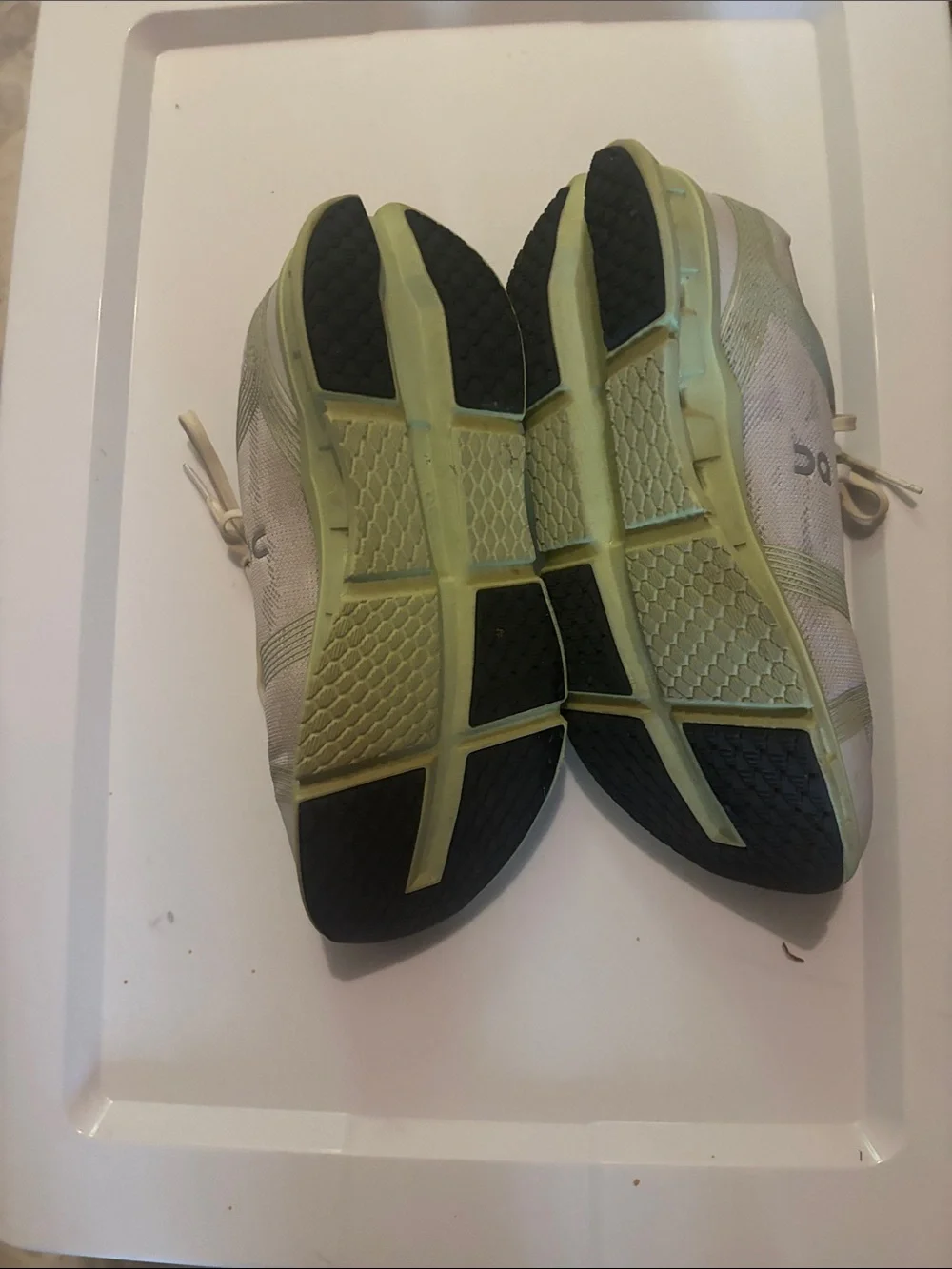 On Running Wonen’s Athletic Shoes — White with Light Green Accents